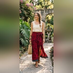 100% CottonRed and Black Batik Print Wrap Around Skirt With Kantha Stich Border.
